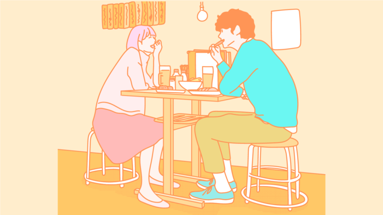 居酒屋で談笑する男女